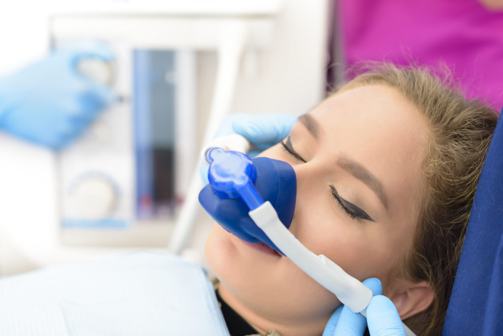 Patient receiving laughing gas at Tulip Tree Dental Care in South Bend, IN.